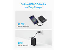 Charger l'image dans la galerie, Batterie externe noire avec téléphone en charge. Texte : 22,5W et 20W.