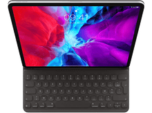 Charger l'image dans la galerie, Une tablette avec un clavier attaché. L'écran affiche un fond d'écran avec différentes couleurs.