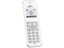 Charger l'image dans la galerie, Téléphone sans fil blanc avec un écran affichant un numéro de téléphone. Boutons pour les appels et les options.