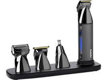Charger l'image dans la galerie, Un kit de toilettage pour hommes Babyliss noir et chromé avec quatre accessoires. La base est noire.
