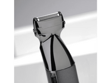 Charger l'image dans la galerie, Gros plan d'une tête de rasoir électrique gris foncé. La lame est visible, inclinée vers le spectateur.