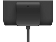 Charger l'image dans la galerie, Gros plan d'un chargeur noir. Le port de charge et un petit voyant lumineux sont visibles.