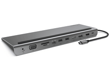 Charger l'image dans la galerie, Une station d'accueil argentée avec plusieurs ports, un câble noir est connecté sur le côté droit.