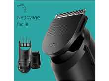 Charger l'image dans la galerie, Gros plan d'une tondeuse à barbe noire avec accessoires. Le texte dit 'Nettoyage facile'.