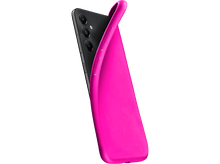 Charger l'image dans la galerie, Coque de téléphone rose sur un téléphone noir. La coque est incurvée et recouvre partiellement le téléphone.