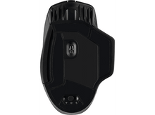 Charger l'image dans la galerie, Une souris d'ordinateur noire. Le dessous est visible avec des boutons et une lumière.