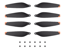 Charger l'image dans la galerie, Hélices de drone noires avec pointes oranges et petits bouchons à vis.