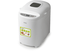 Charger l'image dans la galerie, Machine à pain blanche avec affichage numérique et autocollant montrant du pain. Fond noir.