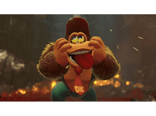 Charger l'image dans la galerie, Donkey Kong tirant la langue, portant une cravate DK et des lunettes de soleil, avec une expression surprise.