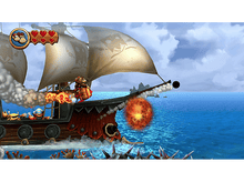 Charger l'image dans la galerie, Une scène du jeu Donkey Kong avec un navire pirate tirant sur une explosion dans l'eau. Des crabes et un personnage sont visibles.
