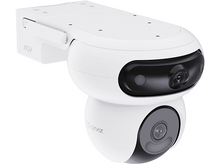 Charger l'image dans la galerie, Caméra de sécurité blanche avec objectif noir, montée sur un mur blanc.