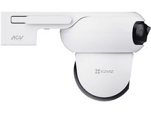 Charger l'image dans la galerie, Caméra de sécurité blanche avec bras, fixée à un mur.