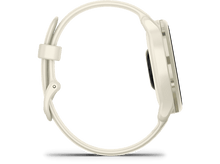 Charger l'image dans la galerie, Vue latérale d'une smartwatch Garmin crème avec écran noir et bracelet blanc.