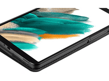 Charger l'image dans la galerie, Gros plan sur une tablette, cadre noir, avec fond abstrait coloré sur l'écran.