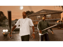 Charger l'image dans la galerie, Deux hommes tenant des battes de baseball, dans une scène de rue avec un coucher de soleil en arrière-plan.