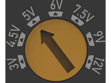 Charger l'image dans la galerie, Un cadran avec des réglages de tension de 3V à 12V. Une flèche indique le réglage actuel.
