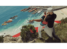 Charger l'image dans la galerie, Deux hommes dans une scène de combat sur une plage. L'un est poussé et l'autre frappe.