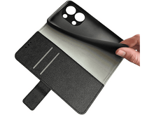 Charger l'image dans la galerie, Étui de téléphone noir ouvert, révélant l'intérieur. Main tenant le téléphone.