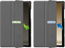 Charger l'image dans la galerie, Un étui de tablette ouvert, montrant une tablette. Le côté gauche indique 'SLEEP', le côté droit 'WAKE'.