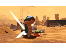 Charger l'image dans la galerie, Kirby combattant un monstre avec une épée dans un environnement désertique. Le monstre est un serpent.