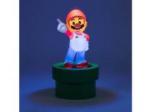 Charger l'image dans la galerie, Une figurine de Mario, debout sur un tuyau vert, pointant, avec un fond bleu.