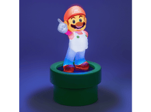 Charger l'image dans la galerie, Figurine de Mario sur une base de tuyau verte, pouce levé, éclairée en bleu et rouge.