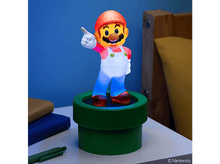 Charger l'image dans la galerie, Figurine lumineuse de Mario debout sur un tuyau vert. Il lève le pouce. Mur bleu en arrière-plan.