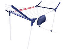 Charger l'image dans la galerie, Un étendoir à linge blanc et bleu, avec un sac bleu foncé.