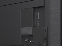 Charger l'image dans la galerie, Gros plan du panneau arrière d'un téléviseur. Il comporte des ports, dont HDMI, USB et diverses entrées de connexion.
