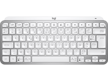 Charger l'image dans la galerie, Clavier Logitech argenté avec touches blanches. Disposition QWERTY. Fond sombre.