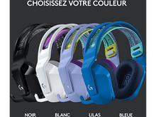 Charger l'image dans la galerie, Casque audio de différentes couleurs, dont noir, blanc, lilas et bleu, sur fond sombre.
