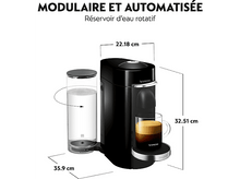 Charger l'image dans la galerie, Machine à café Nespresso noire avec un réservoir d'eau et une tasse de café sur un support.