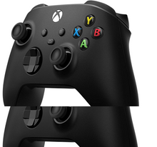 Charger l'image dans la galerie, Manette Xbox noire avec boutons colorés et un câble usb-c. Fond blanc.