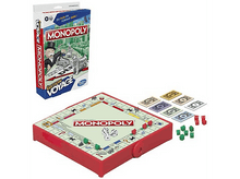 Charger l'image dans la galerie, Jeu de société Monopoly avec boîte, plateau, dés et argent.