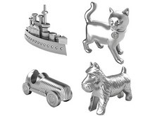 Charger l'image dans la galerie, Quatre pièces argentées du jeu Monopoly sur fond blanc.