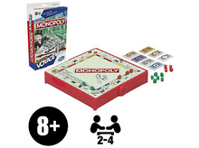 Charger l'image dans la galerie, Un jeu de société Monopoly dans une boîte, avec des pièces de jeu et des dés.