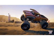 Charger l'image dans la galerie, Un monster truck, El Toro Loco, qui saute. C'est un camion rouge avec une tête de taureau et il est sur une piste de terre.