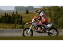 Charger l'image dans la galerie, Une personne faisant du skate dans un skatepark avec un ciel bleu.