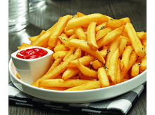 Charger l'image dans la galerie, Gros plan sur des frites dans un bol blanc avec un côté de ketchup rouge sur un tissu à carreaux.