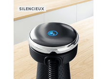 Charger l'image dans la galerie, Gros plan d'un appareil noir avec un bord argenté. Le mot SILENCIEUX est au-dessus.