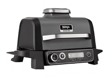 Charger l'image dans la galerie, Un grill Ninja Woodfire noir et gris avec affichage numérique et boutons de commande.