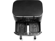 Charger l'image dans la galerie, Une friteuse à air Ninja noire avec deux paniers et un panneau de commande.