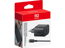 Charger l'image dans la galerie, Boîte d'adaptateur secteur Nintendo Switch 2, boîte rouge avec adaptateur et câble noirs.