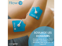 Charger l'image dans la galerie, Un bras avec deux électrodes bleues attachées. Le texte en français dit: