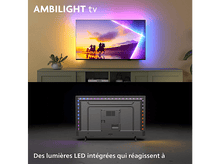 Charger l'image dans la galerie, TV avec lumières colorées autour de l'écran, une scène de paysage est affichée.