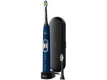 Charger l'image dans la galerie, Brosse à dents électrique Philips Sonicare bleue, base de charge et deux têtes.