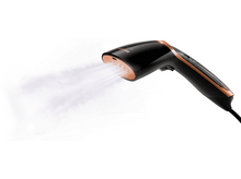 Charger l'image dans la galerie, Vapeur pour vêtements noire et cuivrée émettant de la vapeur sur fond blanc.