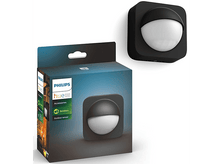 Charger l'image dans la galerie, Capteur extérieur noir Philips Hue et boîte. La boîte montre le capteur et une image de forêt.