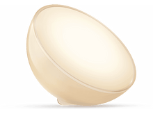 Charger l'image dans la galerie, Une lumière blanche et beige en forme d'œuf. Elle est éclairée et sur fond noir.