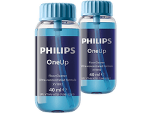 Charger l'image dans la galerie, Deux bouteilles de nettoyant pour sols Philips OneUp. Bouteilles transparentes avec liquide bleu et bouchons bleus.